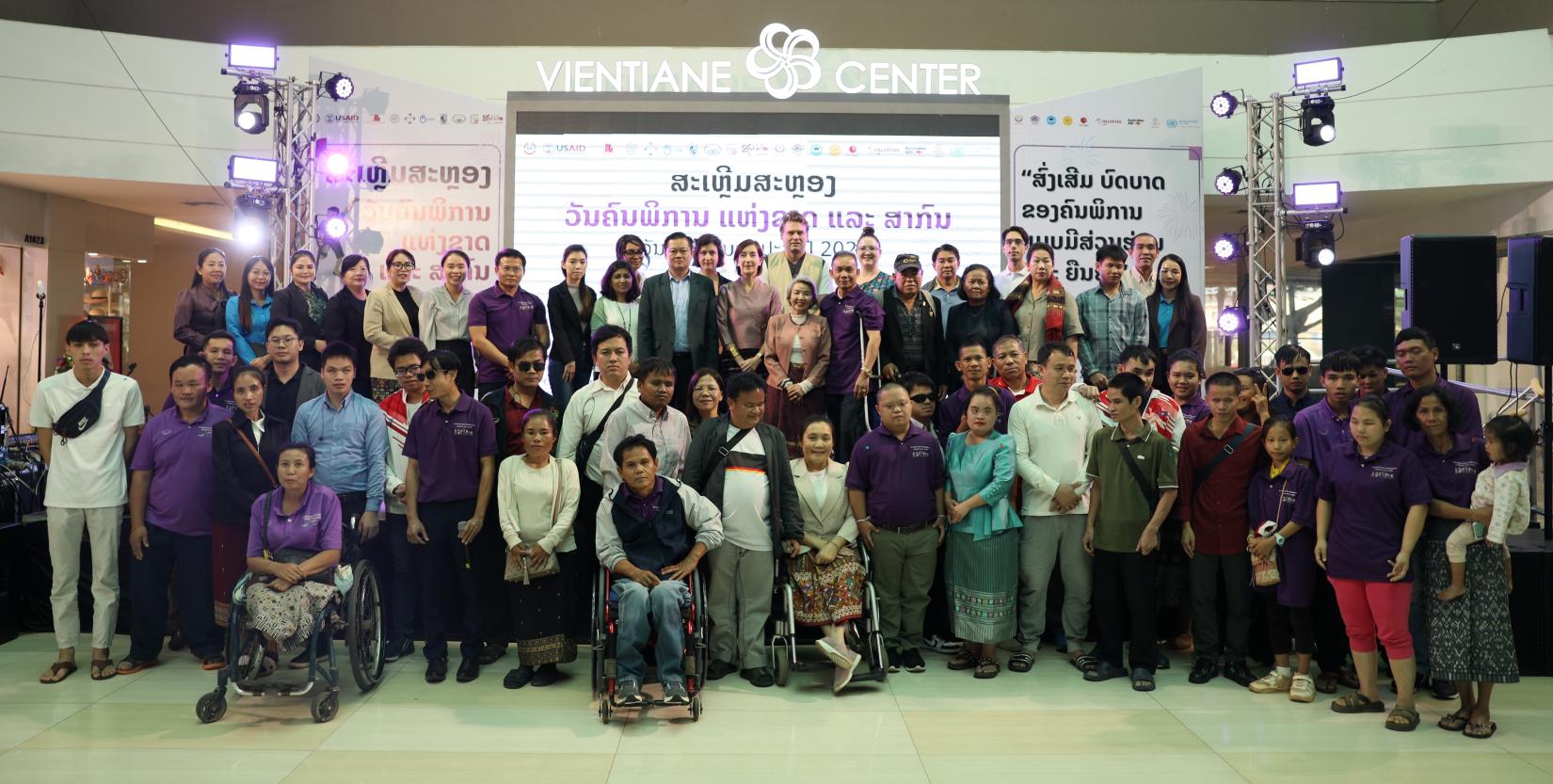 Group photo at Int'l day of Person with Disabilities event