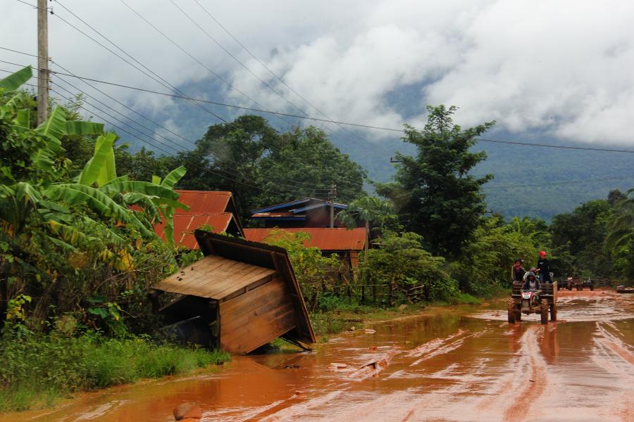 A flood-ravaged road in Khammouane.