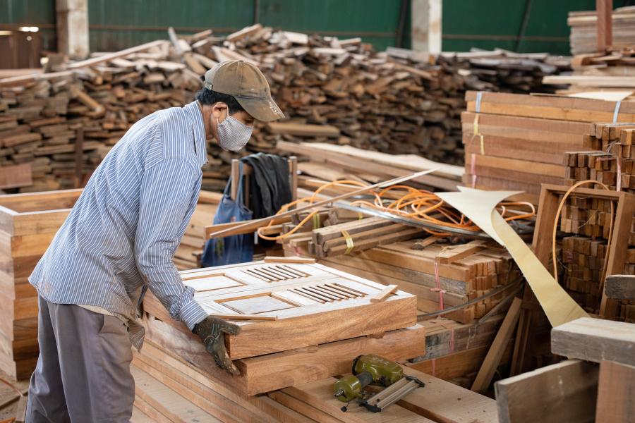 Worker on a wood processing factory in Vientiane.