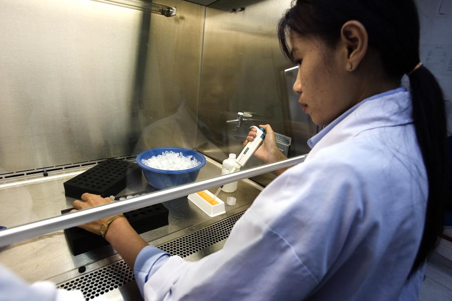 A laboratory worker in Lao PDR.