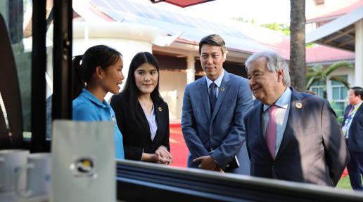 UN Secretary-General António Guterres meets with Vanmai Cooperative member, Pheurp, with UNODC officers